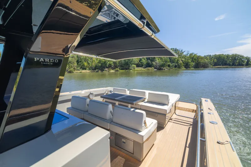 Slide: The Image of Luxurious 2023 Pardo Yachts 43 with elegant seating, cruising on a serene lake. - 37