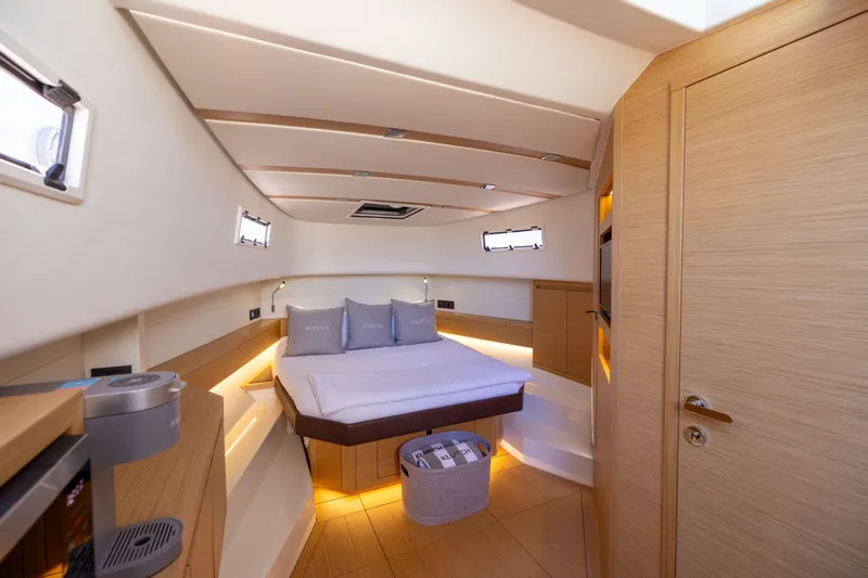 Slide: The Image of Luxurious interior cabin of 2023 Pardo Yachts 43, featuring modern design and cozy bedding. - 48