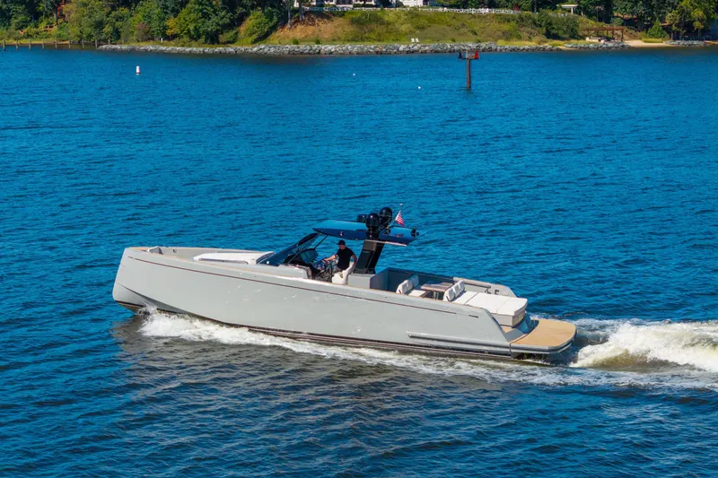 The Image of 2023 Pardo Yachts 43 cruising on a scenic blue waterway. - 2