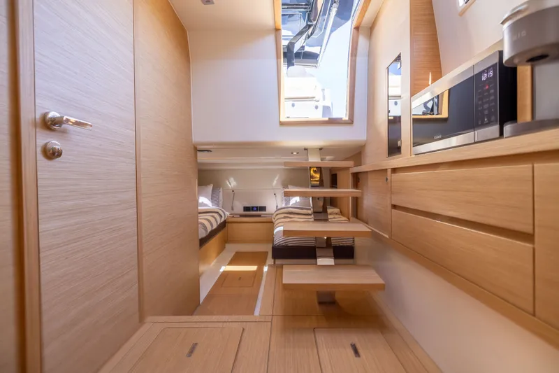 Slide: The Image of Luxurious interior of 2023 Pardo Yachts 43, featuring modern wood finishes and sleek design. - 53