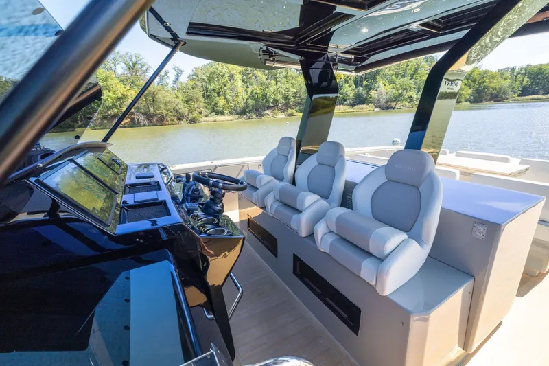 Slide: The Image of Luxurious interior of 2023 Pardo Yachts 43, featuring sleek helm and comfortable seating. - 31