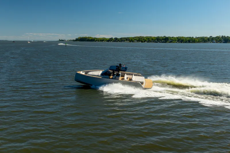 Slide: The Image of 2023 Pardo Yachts 43 cruising on open water under clear blue skies. - 72
