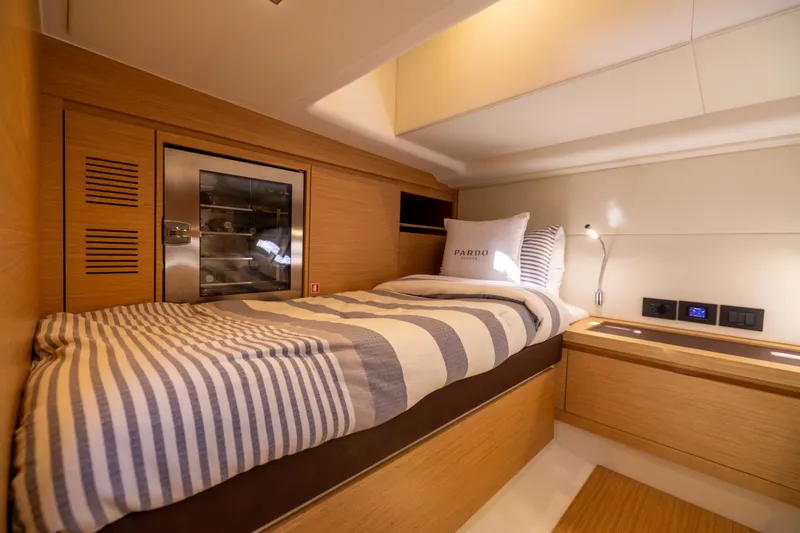 Slide: The Image of Luxurious cabin interior of 2023 Pardo Yachts 43 with cozy bedding and modern amenities. - 56