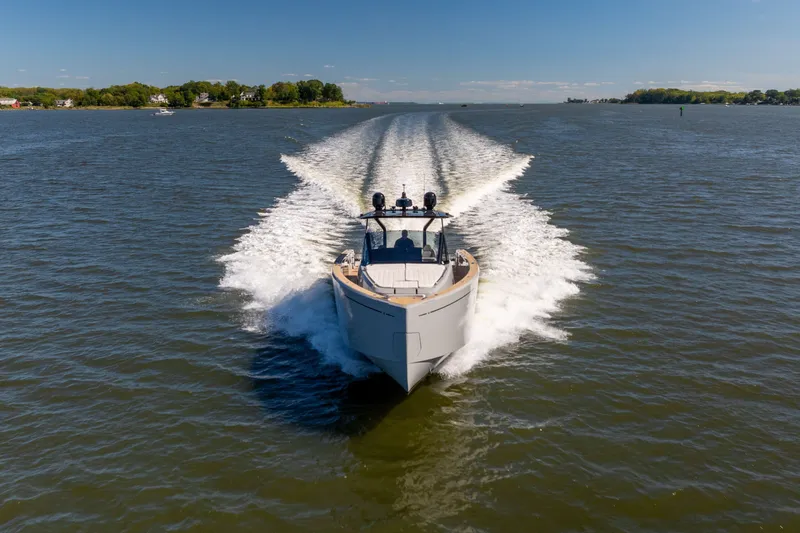 Slide: The Image of 2023 Pardo Yachts 43 cruising on open water under clear blue skies. - 5