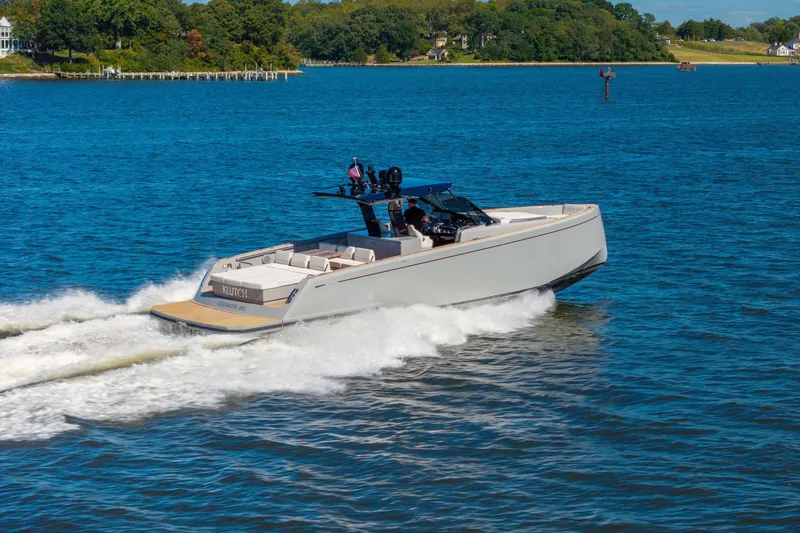 Slide: The Image of 2023 Pardo Yachts 43 cruising on a scenic blue waterway. - 0