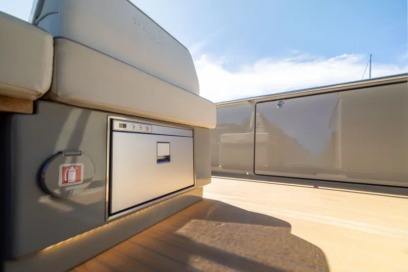 Slide: The Image of 2023 Pardo Yachts 43 interior detail with seating and storage under sunny skies. - 42