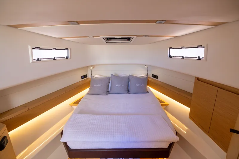 Slide: The Image of Luxurious cabin interior of 2023 Pardo Yachts 43, featuring a cozy bed and modern design. - 49