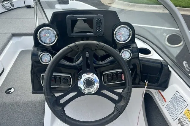 Slide: The Image of Steering console of a 2021 Nitro Z19 boat with gauges and navigation system. - 6