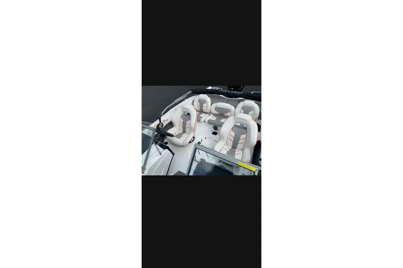Slide: The Image of 2021 Nitro Z19 boat interior with white and gray seating. - 5