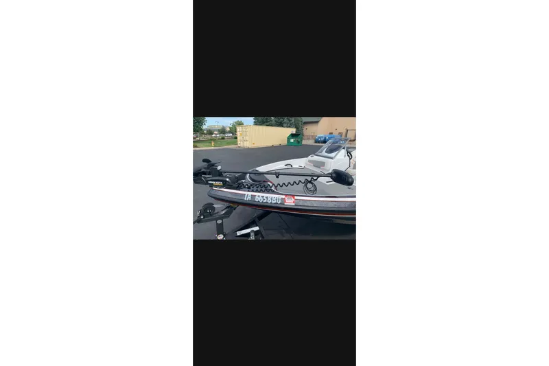 Slide: The Image of 2021 Nitro Z19 boat on trailer, parked outdoors. - 10