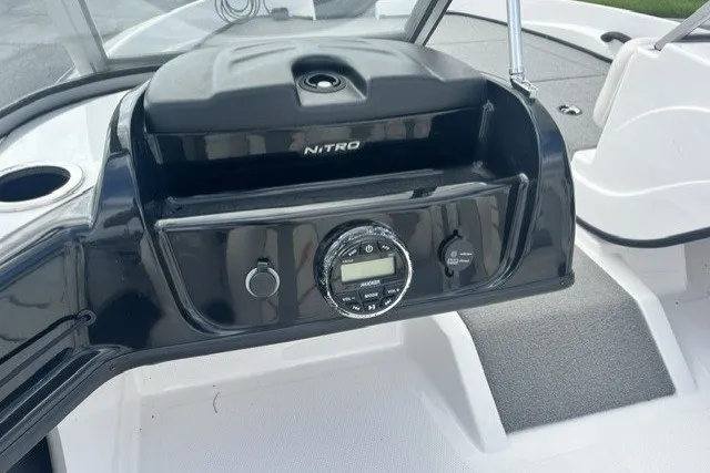 Slide: The Image of Dashboard of a 2021 Nitro Z19 boat featuring control panel and steering area. - 8