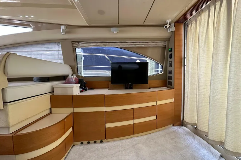 Slide: The Image of Luxurious interior of 2013 Azimut Fly 53 yacht with modern wood cabinetry and TV. - 72