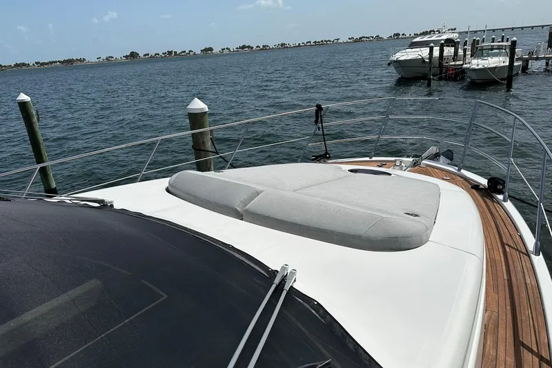 Slide: The Image of Azimut Fly 53 yacht, 2013 model, docked with sunbed on deck, scenic water view. - 47
