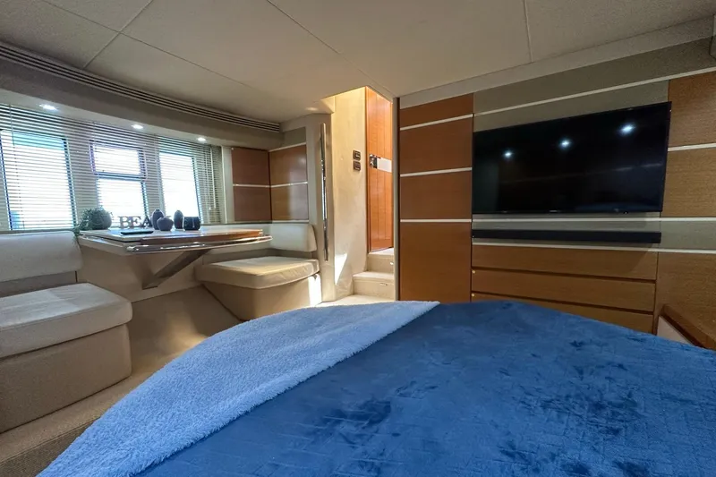 Slide: The Image of Luxurious interior of 2013 Azimut Fly 53 yacht with modern furnishings and large windows. - 18