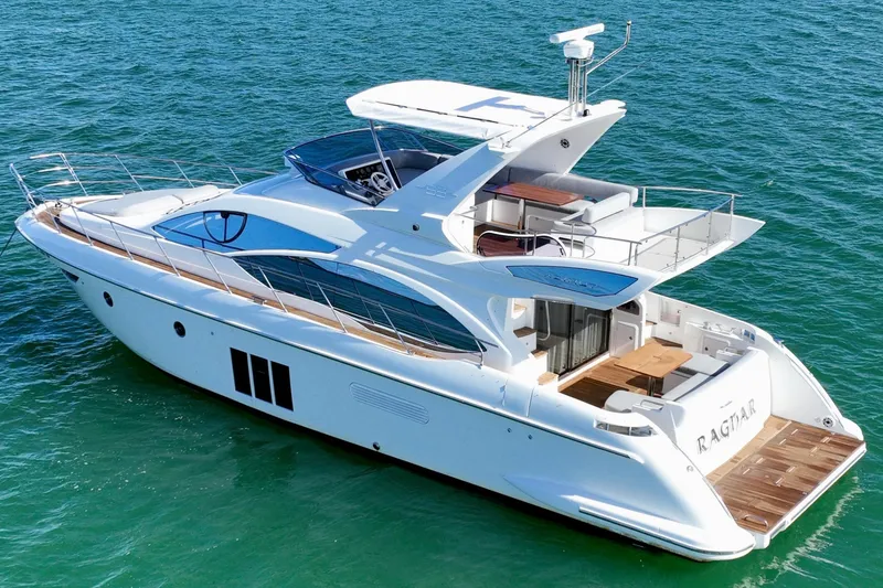 Slide: The Image of Azimut Fly 53 yacht, 2013 model, cruising on clear blue waters. - 2