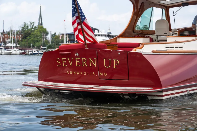 Slide: The Image of Hinckley Picnic Boat 37 MKIII, 2020, cruising in Annapolis, Maryland, with American flag. - 55