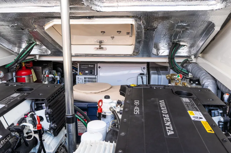 Slide: The Image of Engine room of 2020 Hinckley Picnic Boat 37 MKIII with Volvo Penta engines and Cummins Onan generator. - 52