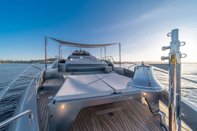 Slide: The Image of Luxurious 2021 Riva 110' Dolcevita yacht deck with sunbeds and ocean view. - 33
