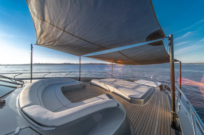 Slide: The Image of Luxurious deck of 2021 Riva 110' Dolcevita yacht with sun loungers and canopy. - 35