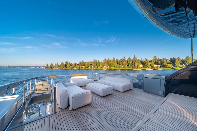 Slide: The Image of Luxurious deck of 2021 Riva 110' Dolcevita yacht with scenic waterfront view. - 34