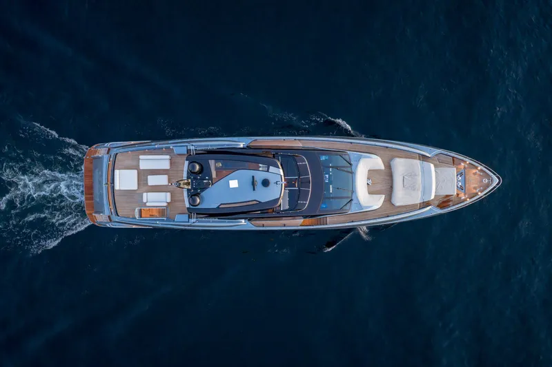 Slide: The Image of Aerial view of 2021 Riva 110' Dolcevita yacht cruising on open water. - 20