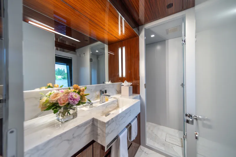 Slide: The Image of Luxurious bathroom on 2021 Riva 110' Dolcevita yacht with marble sink and elegant decor. - 71