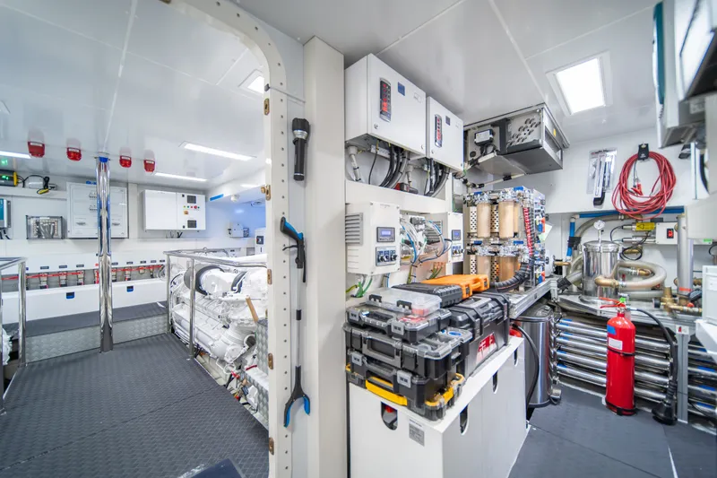 Slide: The Image of Engine room of 2021 Riva 110' Dolcevita yacht, featuring advanced equipment and tools. - 91