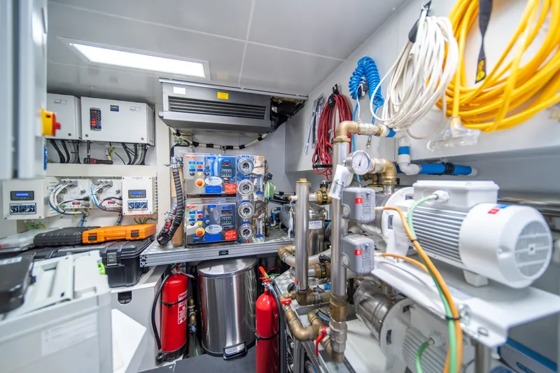 Slide: The Image of Engine room of 2021 Riva 110' Dolcevita yacht with advanced machinery and equipment. - 95