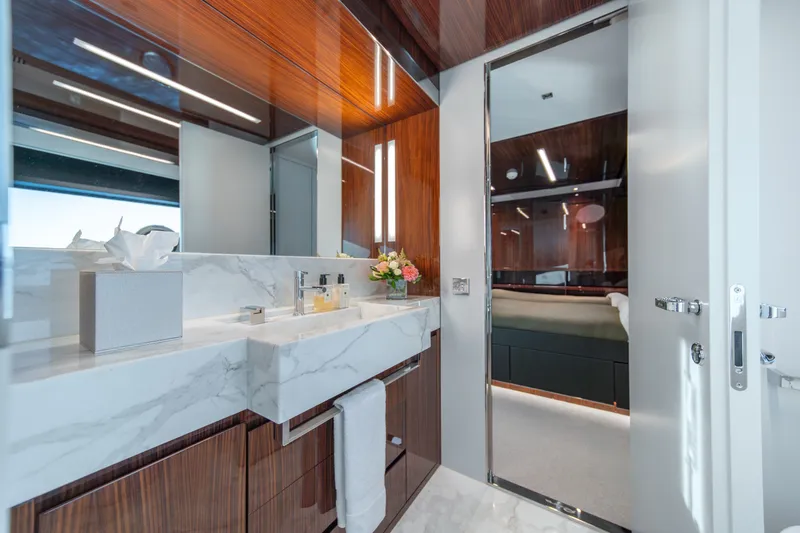 Slide: The Image of Luxurious bathroom on 2021 Riva 110' Dolcevita yacht with marble sink and elegant wood finishes. - 74