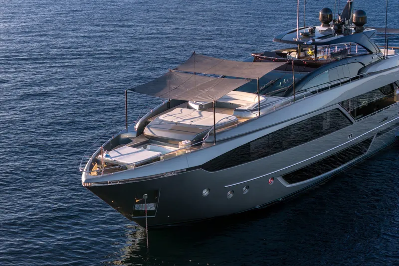 Slide: The Image of Luxurious 2021 Riva 110' Dolcevita yacht on serene blue waters. - 17