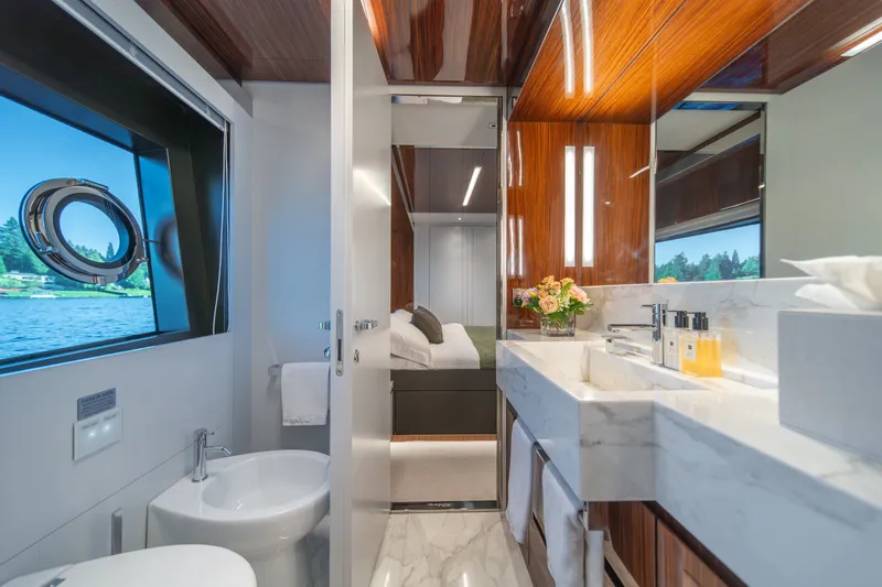 Slide: The Image of Luxurious bathroom on 2021 Riva 110' Dolcevita yacht with elegant wood and marble finishes. - 69