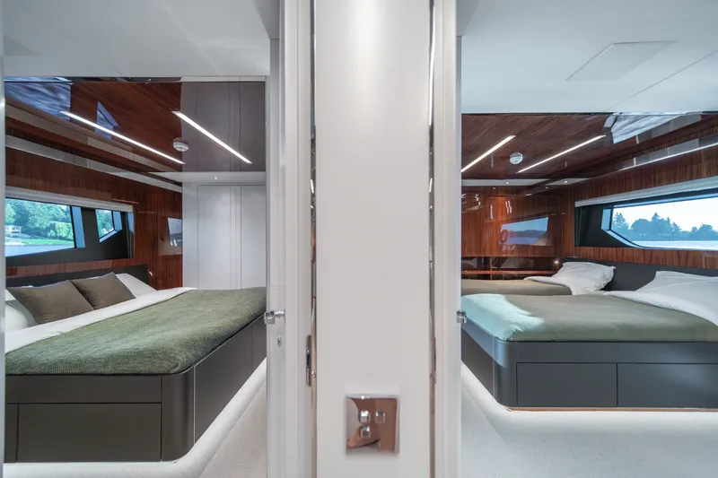 Slide: The Image of Luxurious interior of 2021 Riva 110' Dolcevita yacht featuring elegant twin bedrooms. - 66