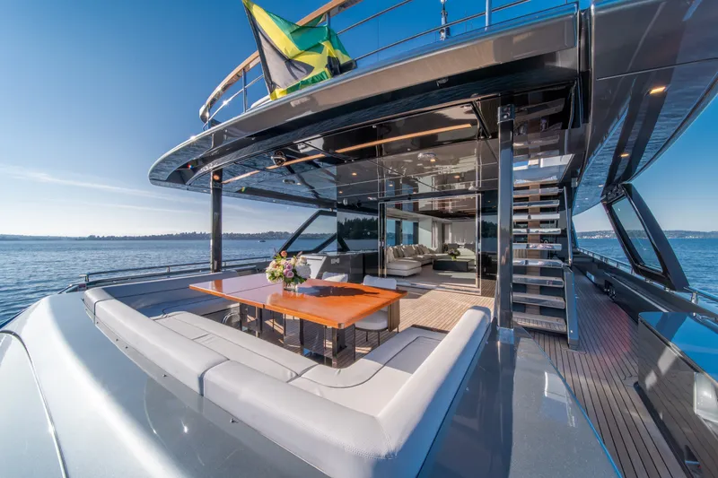 Slide: The Image of Luxurious 2021 Riva 110' Dolcevita yacht with elegant outdoor seating and ocean view. - 37