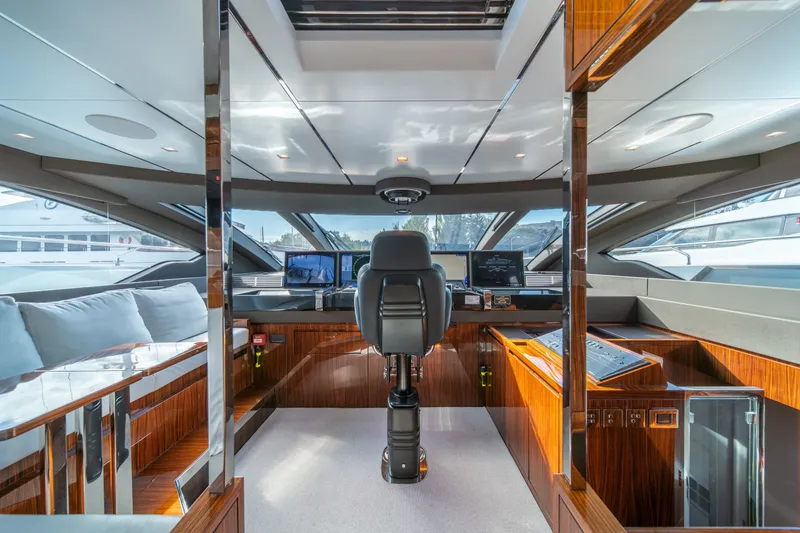 Slide: The Image of Luxurious interior of 2021 Riva 110' Dolcevita yacht cockpit with modern controls. - 49