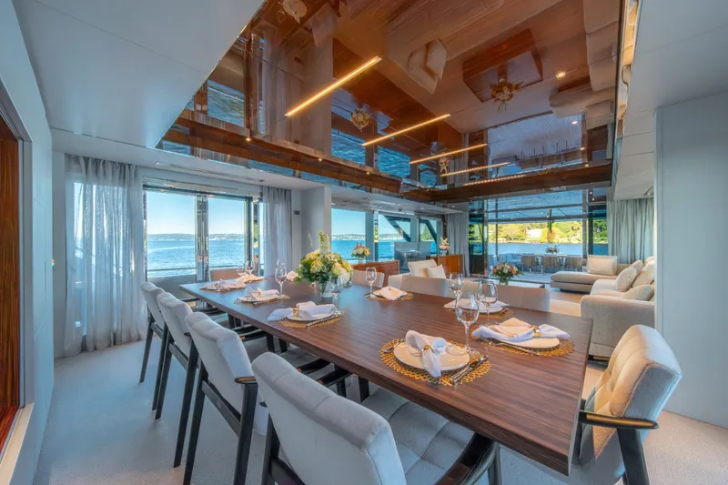 Slide: The Image of Luxurious dining area on 2021 Riva 110' Dolcevita yacht with ocean view. - 54