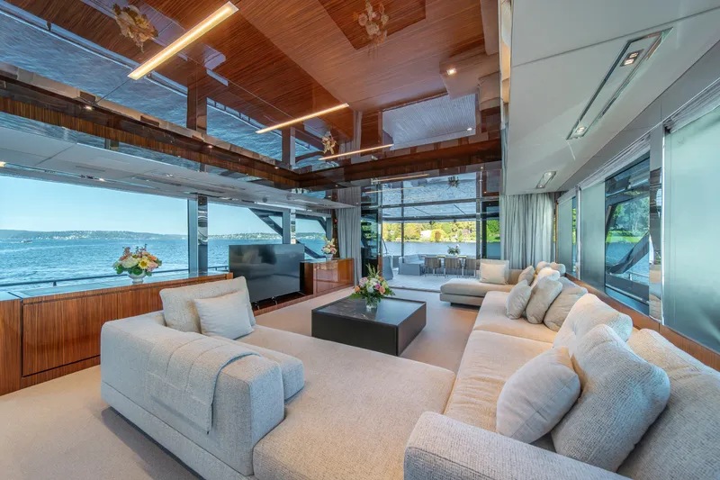 Slide: The Image of Luxurious interior of 2021 Riva 110' Dolcevita yacht with elegant seating and panoramic views. - 53