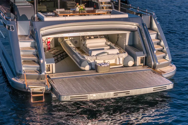 Slide: The Image of Luxury Riva 110' Dolcevita yacht with open garage and tender, 2021 model. - 22