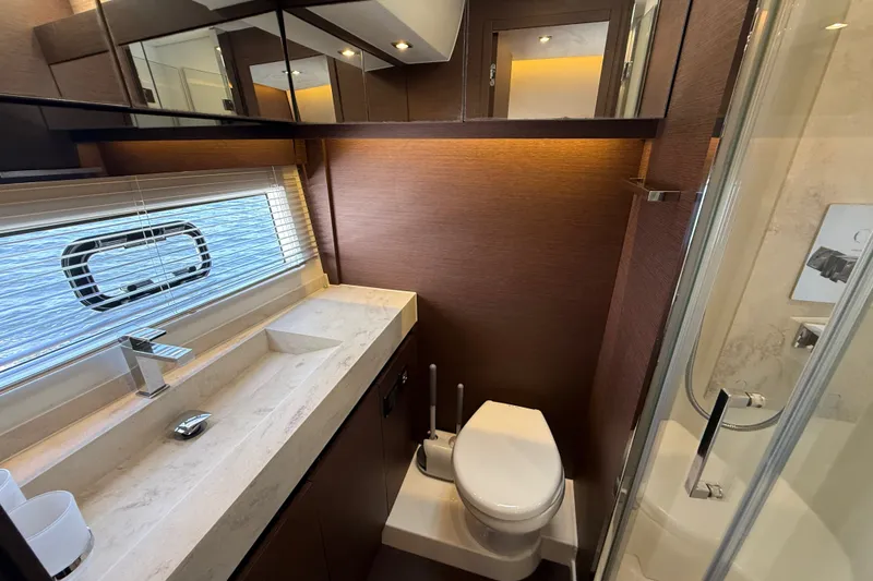 Slide: The Image of Luxurious bathroom interior of 2017 Prestige 630 yacht with modern fixtures and elegant design. - 40