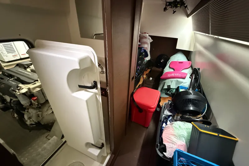 Slide: The Image of Interior view of a 2017 Prestige 630 yacht engine room and storage area. - 44