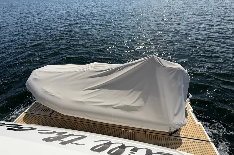 Slide: The Image of Covered boat on water, Prestige 630, 2017 model, with wooden deck. - 19