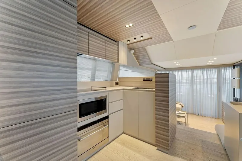 Slide: The Image of Modern kitchen interior on 2020 Ferretti Yachts 670, featuring sleek cabinetry and appliances. - 36