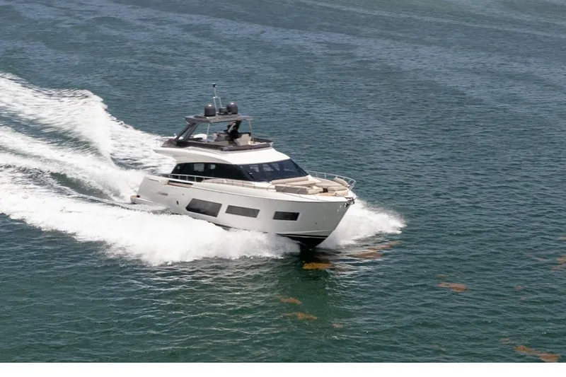 Slide: The Image of Ferretti Yachts 670, 2020 model, cruising on open water with sleek design. - 3
