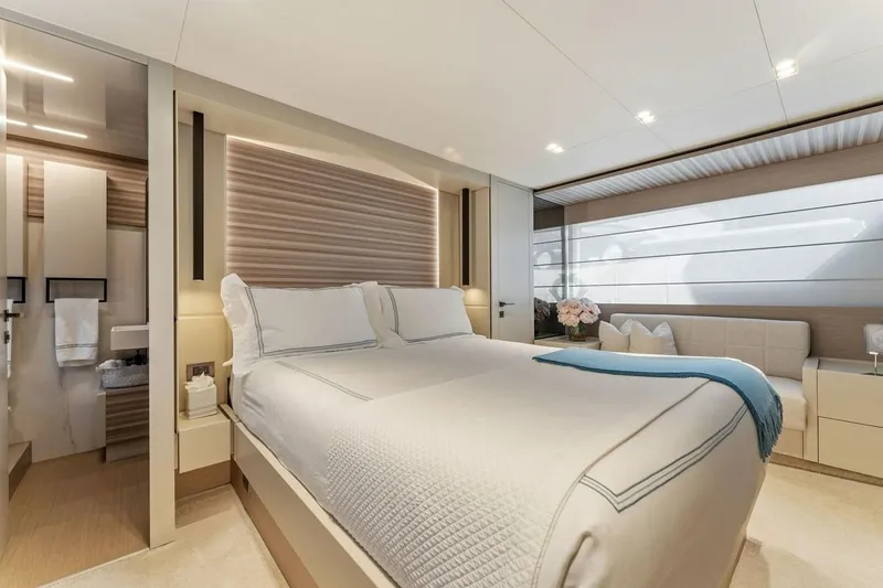 Slide: The Image of Luxurious bedroom interior of 2020 Ferretti Yachts 670 with modern design and elegant decor. - 46