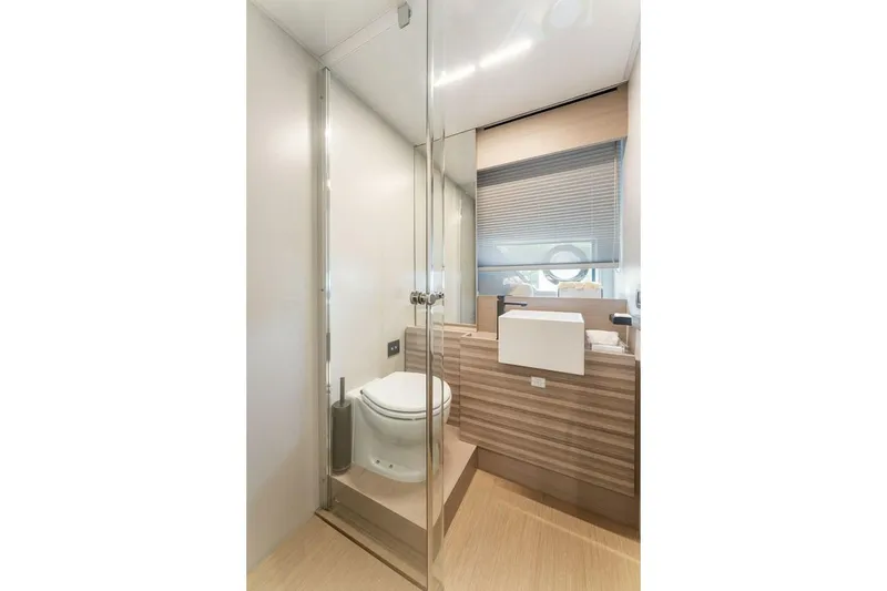 Slide: The Image of Luxurious bathroom interior of 2020 Ferretti Yachts 670 with modern fixtures and elegant design. - 63