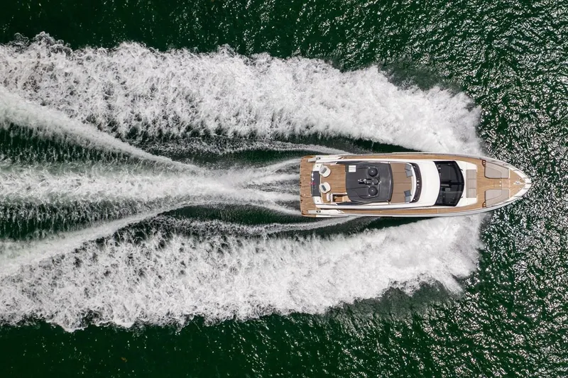 Slide: The Image of Aerial view of 2020 Ferretti Yachts 670 cruising on open water. - 5
