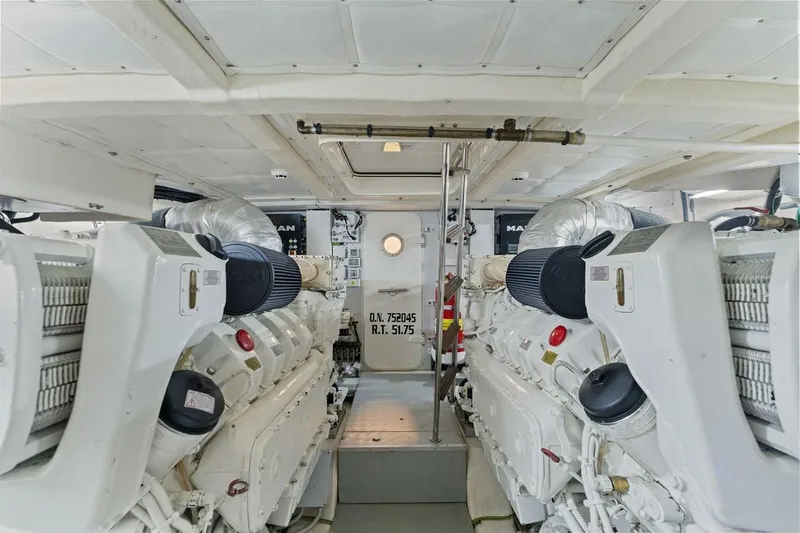 Slide: The Image of Engine room of 2020 Ferretti Yachts 670, showcasing dual MAN engines and mechanical systems. - 68