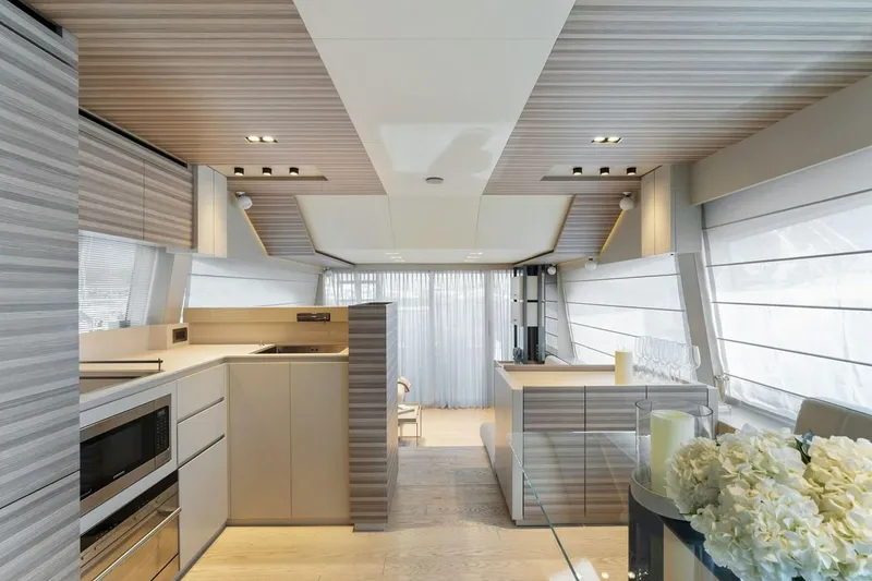 Slide: The Image of Luxurious interior of 2020 Ferretti Yachts 670 with modern kitchen and elegant decor. - 38