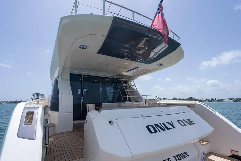 Slide: The Image of Luxury Ferretti Yachts 670, 2020 model, docked with clear sky background. - 19