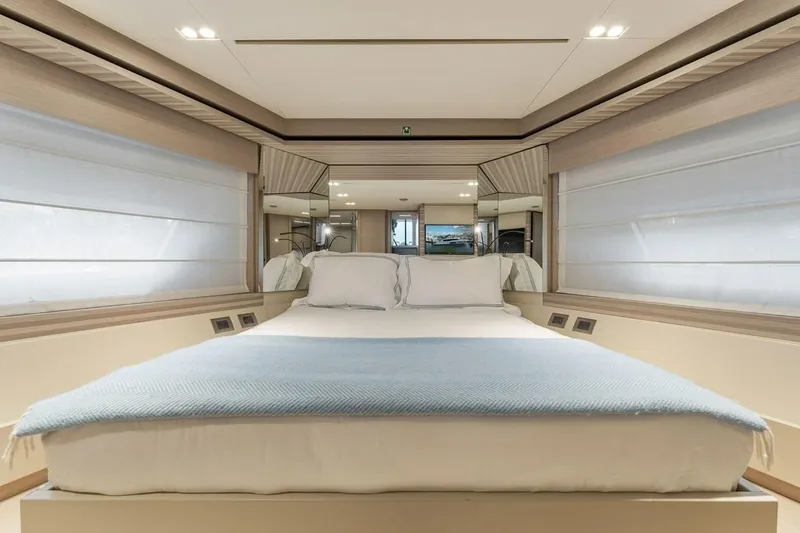 Slide: The Image of Luxurious bedroom interior of 2020 Ferretti Yachts 670 with elegant bedding and modern design. - 57
