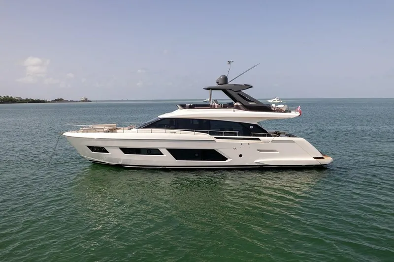 Slide: The Image of 2020 Ferretti Yachts 670 luxury yacht cruising on calm ocean waters. - 7